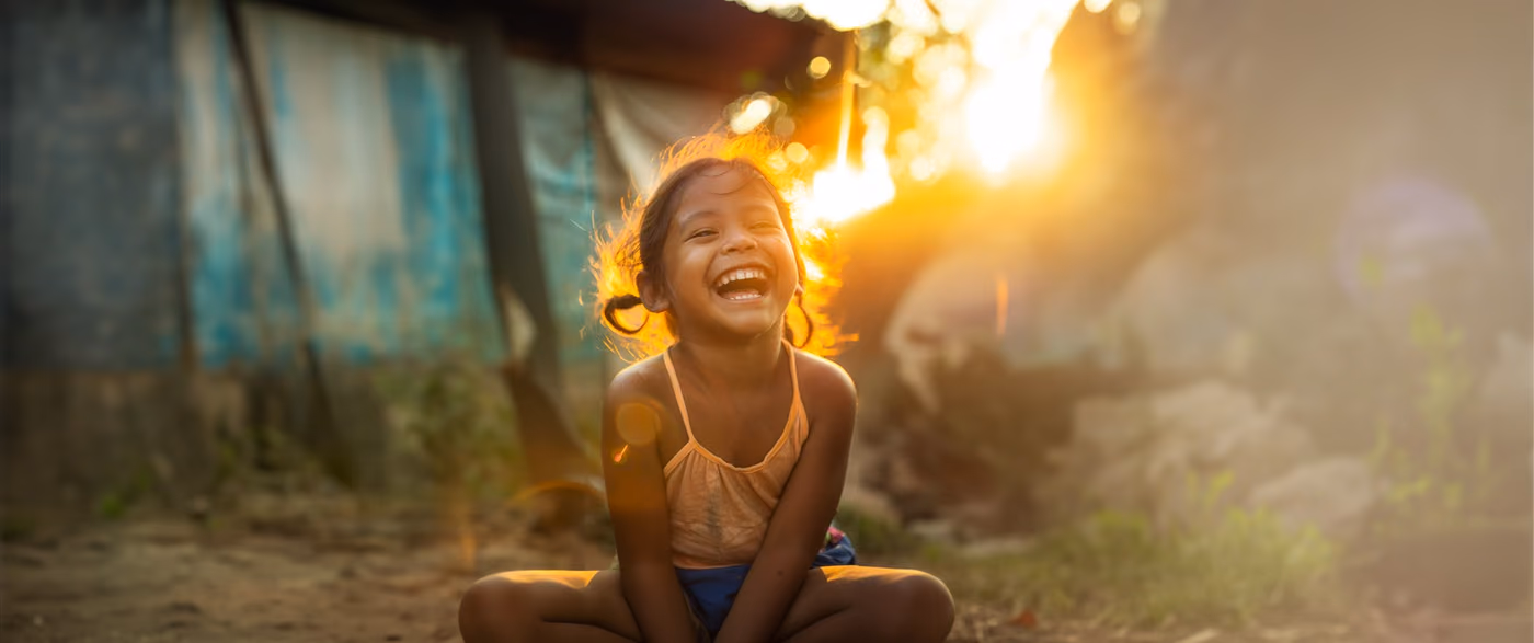 Laughing girl in the evening light